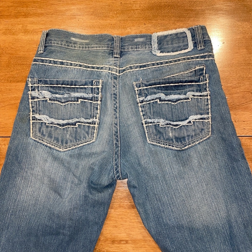 Fringed pocket jeans